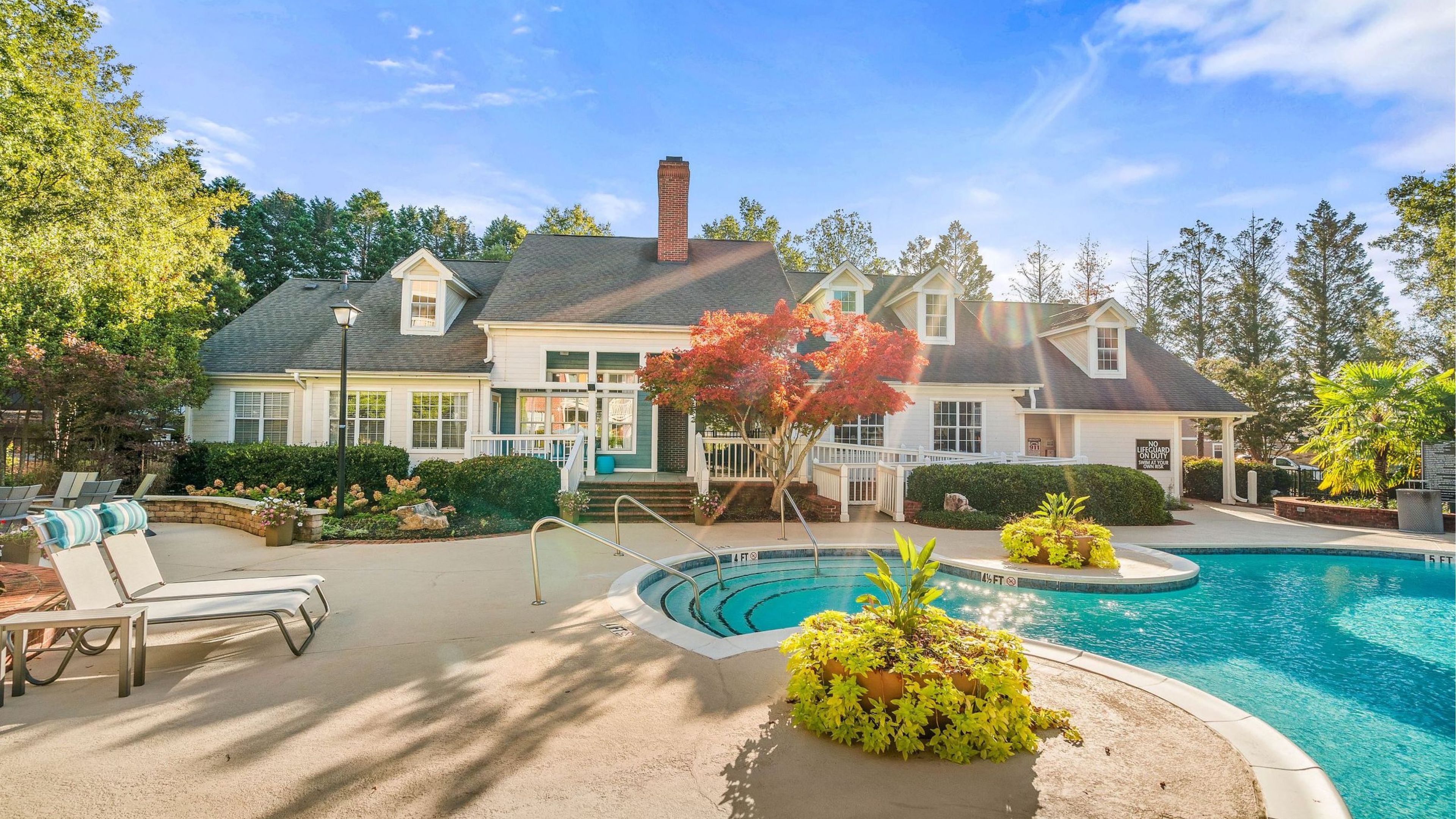 The Haywoodresident pool amenity with lounge chairs.
